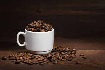 Cup of coffee on brown background