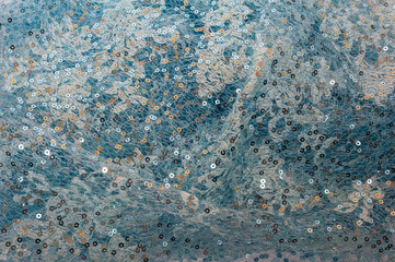 Pale blue Sequins Background. Blue background