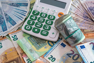 exchange concept pln polish money with euro bills and calculator