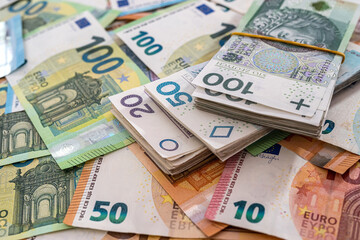  polish and euro money as background - obrazy, fototapety, plakaty