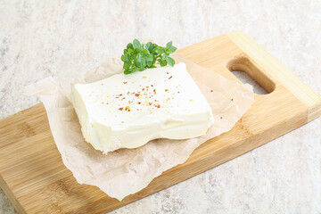 Greek Feta cheese over board