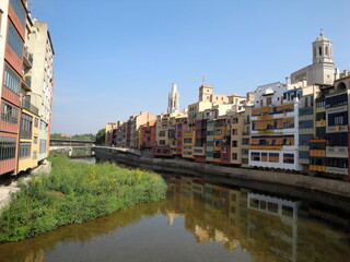 Multicolored houses on the river bank