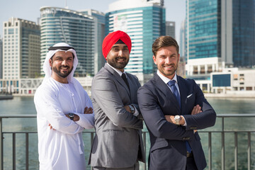 Multi-ethnic business team meeting outdoors in Dubai