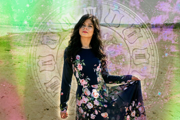 Woman posing against the background of a large clock, time

