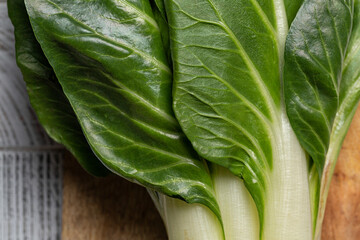 Close-up of swiss chard leaves: leafy green high-fiber vegetables, low in calories, making it a weight-loss-friendly food. Horizontal image, selective focus..