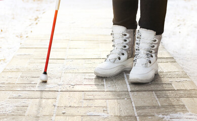 Inclusion, a blind man with a cane for the blind disabled