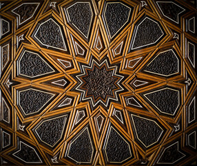 Islam arab pattern. Decorating tile on the wall panel in Morocco. Geometric abstract muslim texture