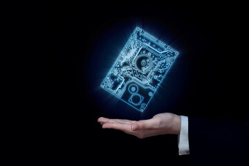 digital information storage concept electronic chip in the hands of a businessman, big data and...
