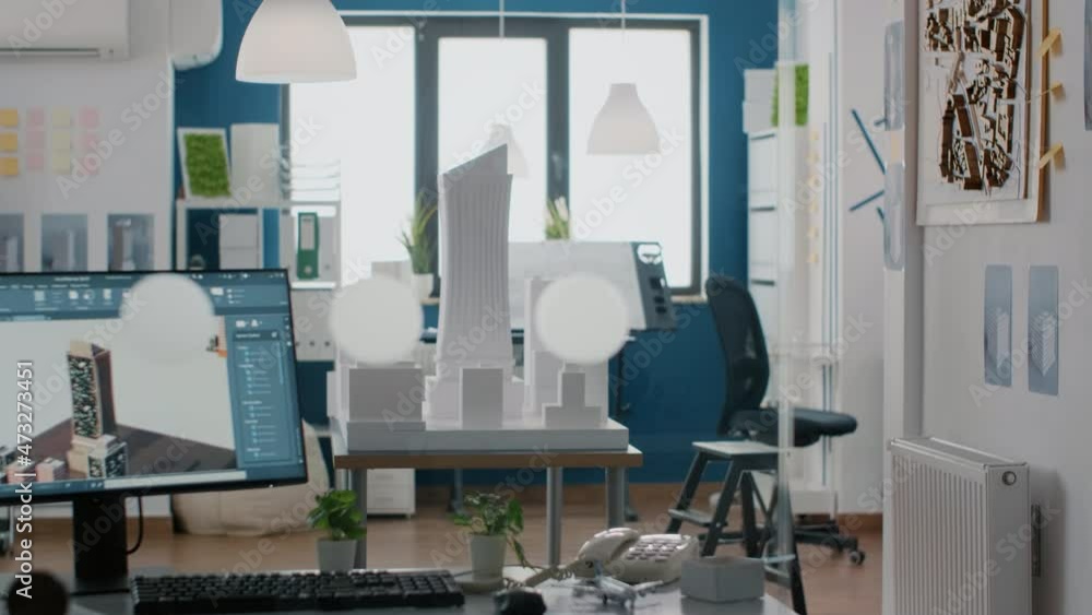 Poster nobody in office with building model and maquette on table, 3d construction site on monitor. empty w
