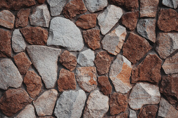 brown stone wall texture background .  Old castle stone wall texture .