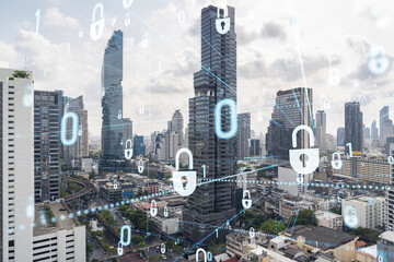 Padlock icon hologram over panorama city view of Bangkok to protect business in Southeast Asia. The concept of information security shields. Double exposure.