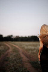 woman walking on the road