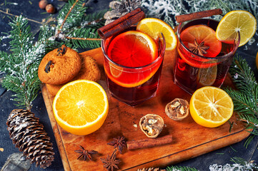 Hot Christmas mulled wine on the table .
