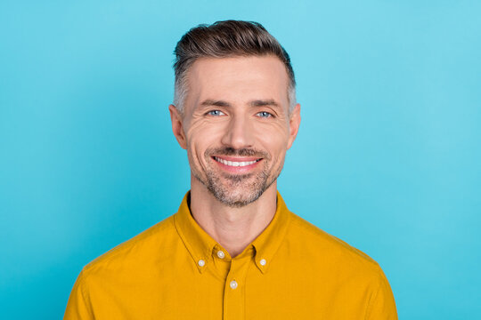 Portrait of attractive cheerful content man executive top maneger agent broker isolated over bright blue color background - Powered by Adobe