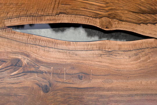 Detail And Live Edge Of A Dinning Table Made From Epoxy Resin