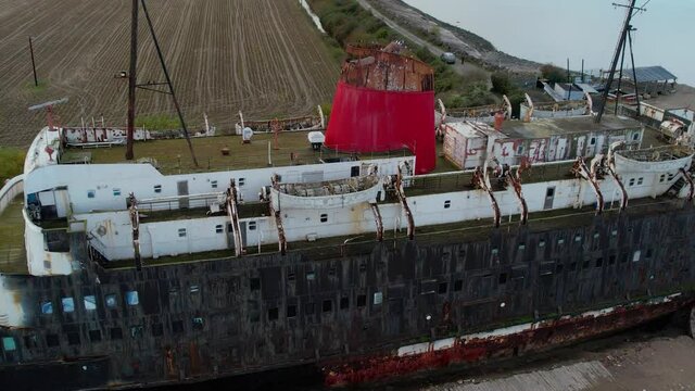 Close up aerial showing the top decks of the TSS Duke of Lancaster tourist attraction in North Wales also known as The Fun Ship.