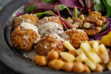 Tasty vegan salad with falafel and chickpea