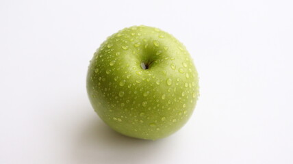 Green apple isolated on white background. Apple with water drops.
