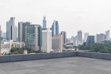 Obraz na płótnie Canvas Panoramic Kuala Lumpur skyline view, concrete observatory deck on rooftop, daytime. Asian corporate and residential lifestyle. Financial city downtown, real estate. Product display mockup empty roof