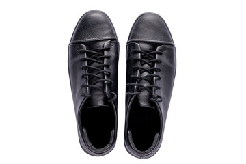 A pair of new black mens classic sneakers on a white isolated background.
