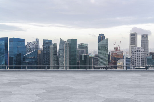 Panoramic Singapore skyline view, concrete observatory deck on rooftop, daytime. Asian corporate and residential lifestyle. Financial city downtown, real estate. Product display mockup empty roof - Powered by Adobe