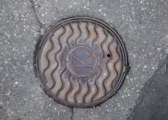 manhole cover in the street
