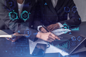 Two information technology specialist brainstorming on project to create a new approach to develop...