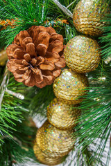 Christmas ornaments decorated on tree. Xmas decoration are used to festoon artificial tree.