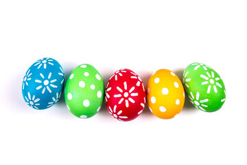 Colorful handmade easter eggs isolated on a white.
