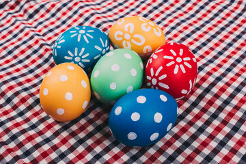Perfect colorful handmade easter eggs on a fabric background