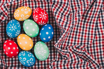 Perfect colorful handmade easter eggs on a fabric background