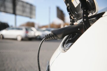 Close Up Of Electric Car Being Charged