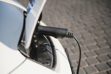 Close Up Of Electric Car Being Charged