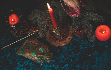 Winter Christmas prediction on a Candle and Tarot cards. Magical esoteric concept. Astrology and...