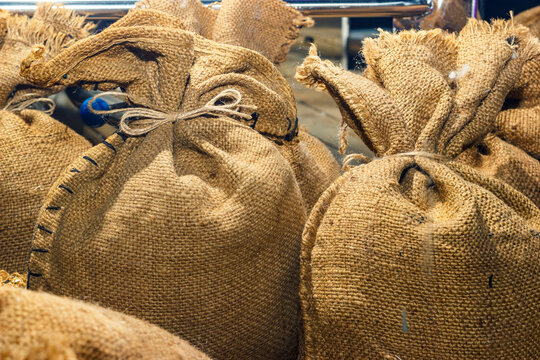 Agricultural hessian cloth sacks, rough sack material and linen fabric textile brown burlap or sackcloth bags