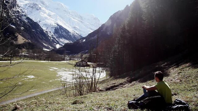 Sipping water from trek exhaustion Switzerland Lauterbrunnen alps