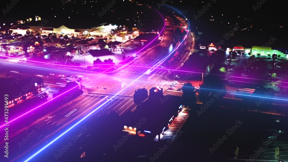 Poster aerial hyper lapse of traffic light trails in a illuminated intersection - 3d animation vfx