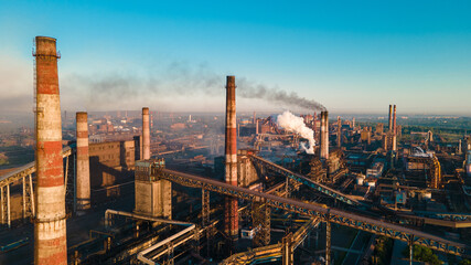 Fototapeta na wymiar factory smoke from chimneys from a height panorama