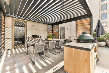 Spacious veranda with dining zone and grill