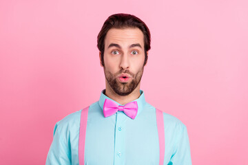 Photo of pretty shocked young guy dressed teal clothes big eyes isolated pink color background