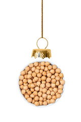 Christmas ball is made from chickpea isolated on white background.