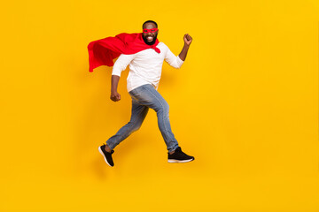 Fototapeta na wymiar Full length profile photo of crazy cheerful guy flight travel toothy smile isolated on yellow color background