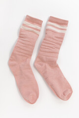 pair of worn socks isolated on white background