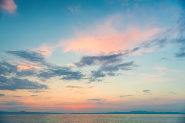 Obraz na płótnie Canvas blue sky with clouds and sea, sunset