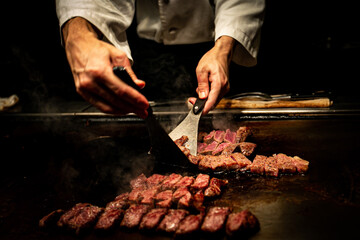 Cooking steak by chef