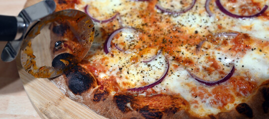 fresh cooked Italian style pizza fresh from the pizza oven 