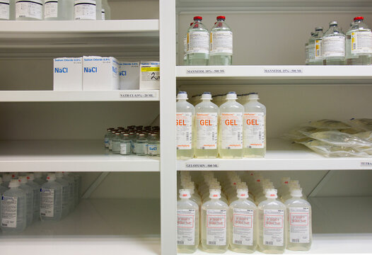 Modern hospital storage facilities, shelves of products for treatment and hospital procedures. 