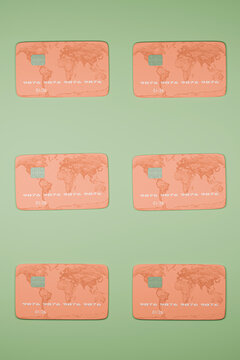 Credit cards arranged on green background