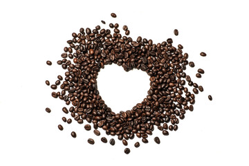 Top view. Heart made of coffee beans isolated on white background.concept love coffee beans with copy space.