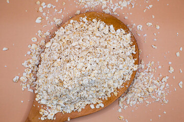 Oat bran in wooden spoon